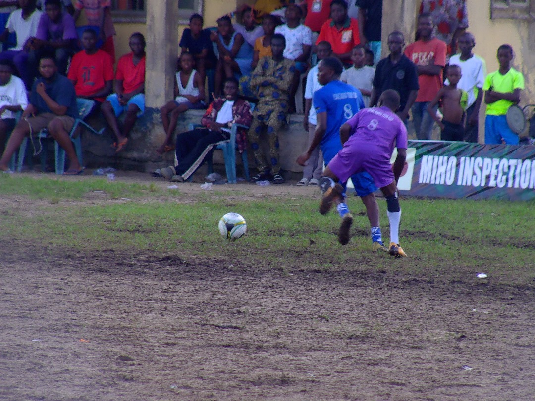 Intense football match action