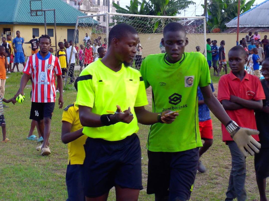 Referee officiating the match