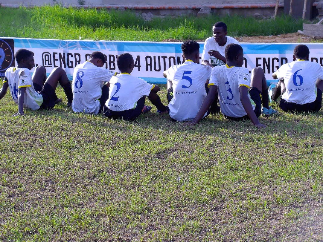 Coach giving tactical instructions