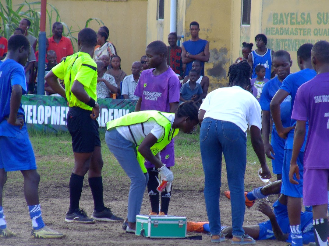 Medical team assisting injured player